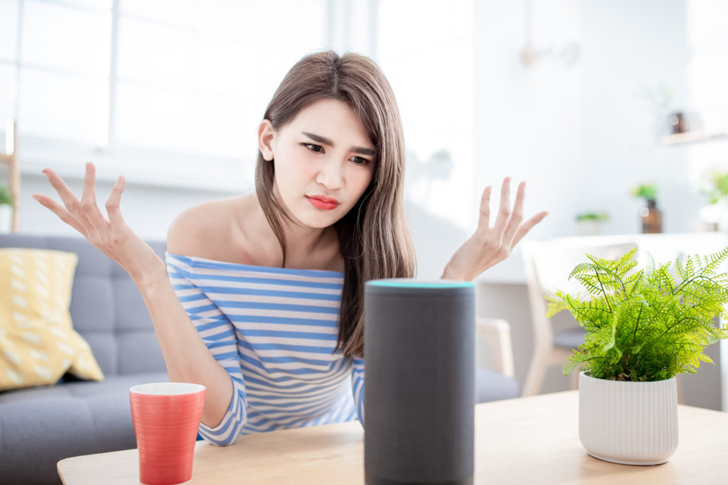 Smart AI speaker Error - Young Woman angry because voice assistant can not recognize her language