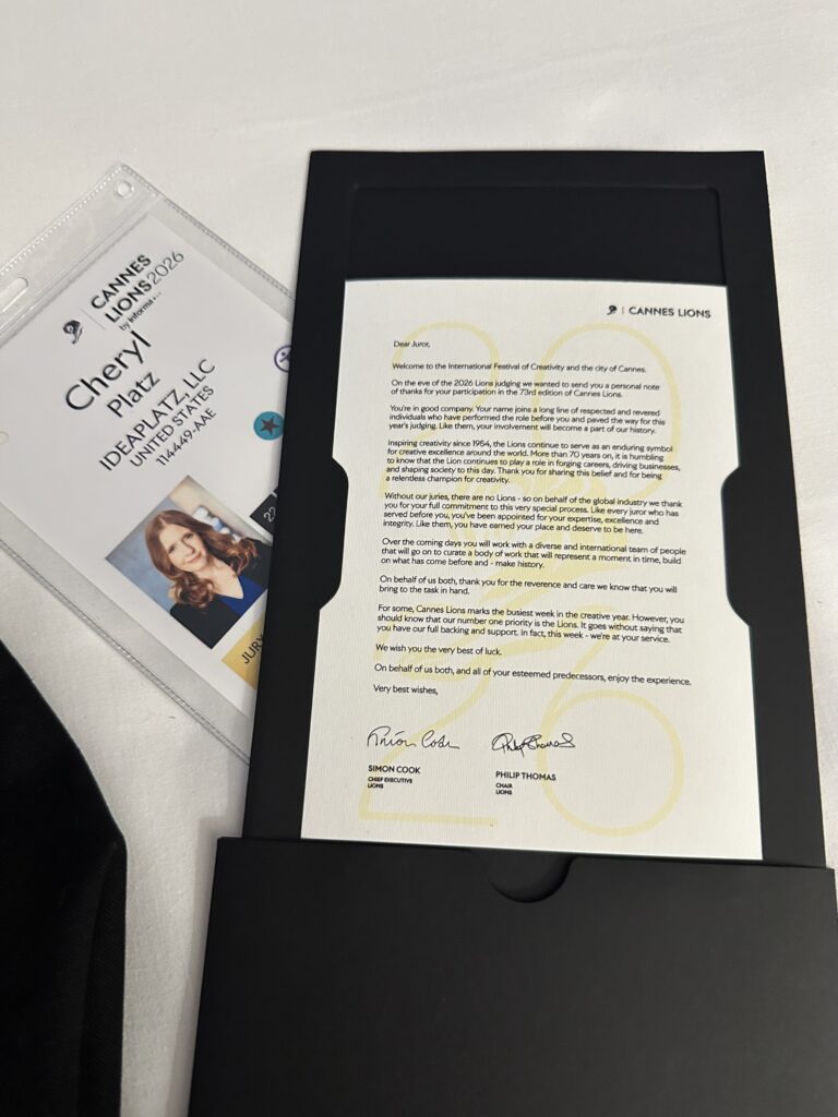 Cheryl's Jury badge and a welcome letter from Cannes Lions to jurors.