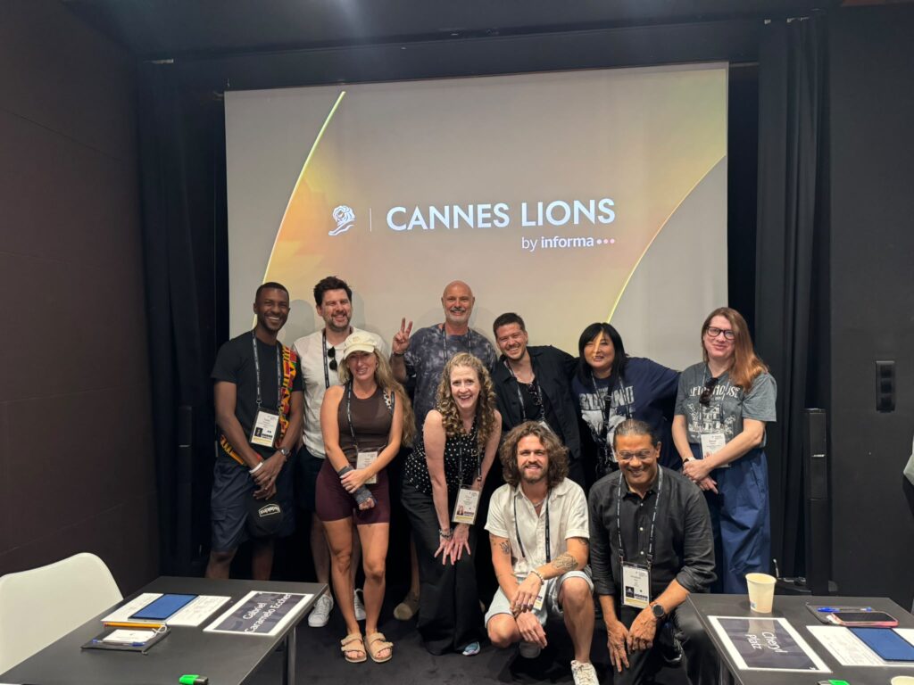The Entertainment Lions for Gaming jury poses in their screening room before beginning deliberations.